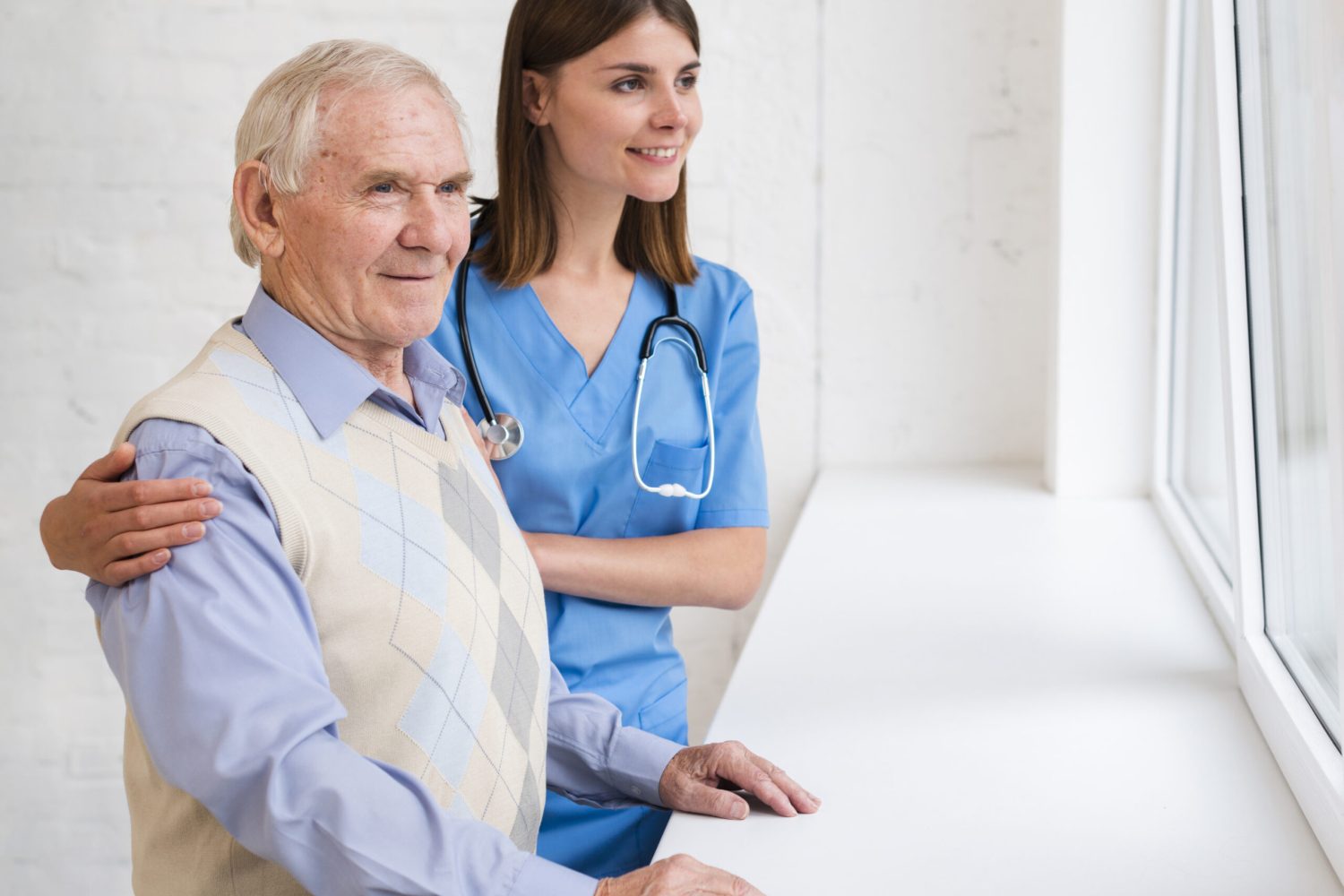 caregiver-old-man-looking-window