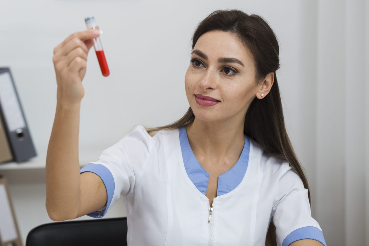 female-doctor-looking-blood-sample